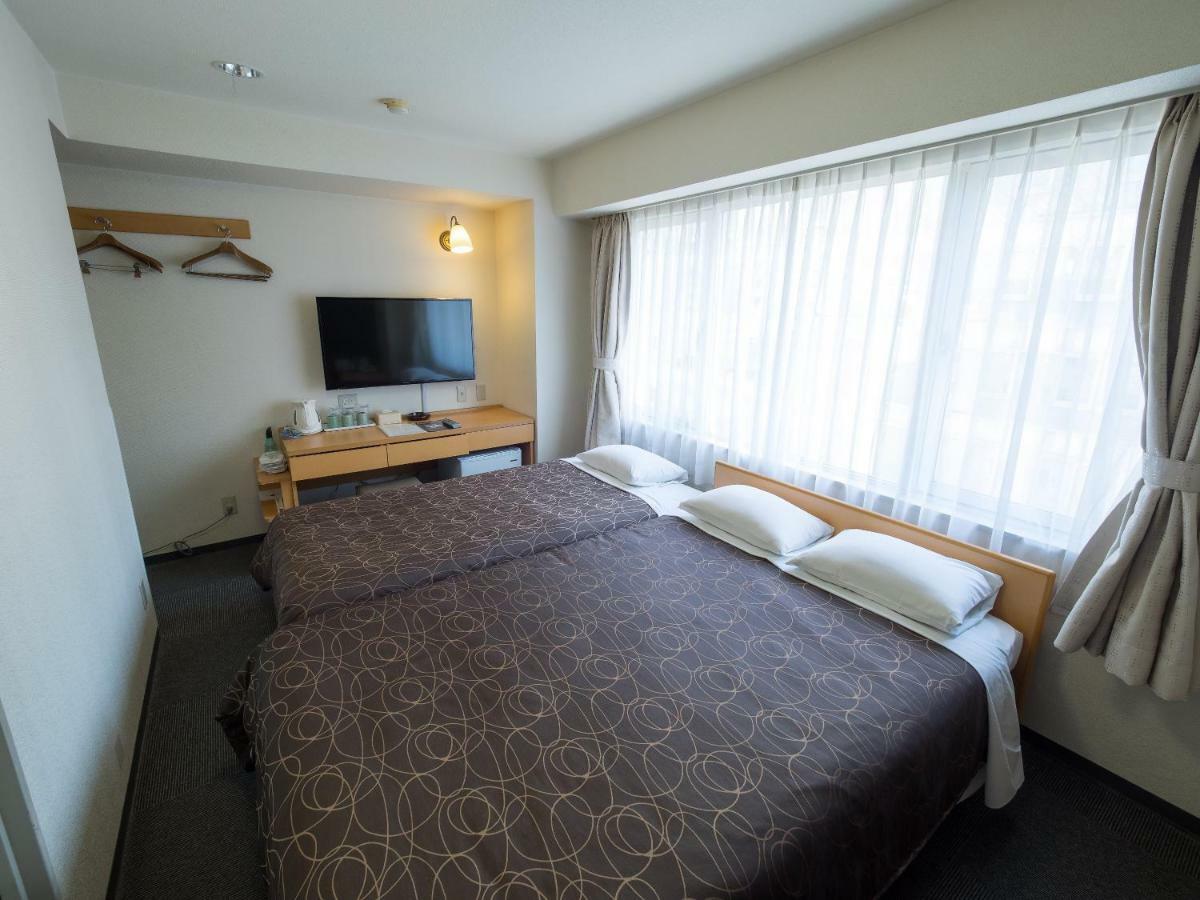 Hotel Shin Ōsaka Extérieur photo
